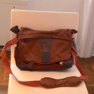 Tumi Laptop Briefcase. Many pockets.  Depth 10" (can go to 12").  Width 14".
